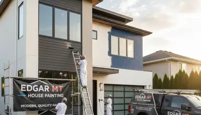 Professional house painters in Billings MT applying fresh exterior paint to a residential home